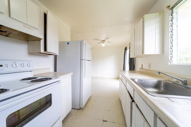 kitchen featuring white cabinetry, sink, white appliances, and ceiling fan