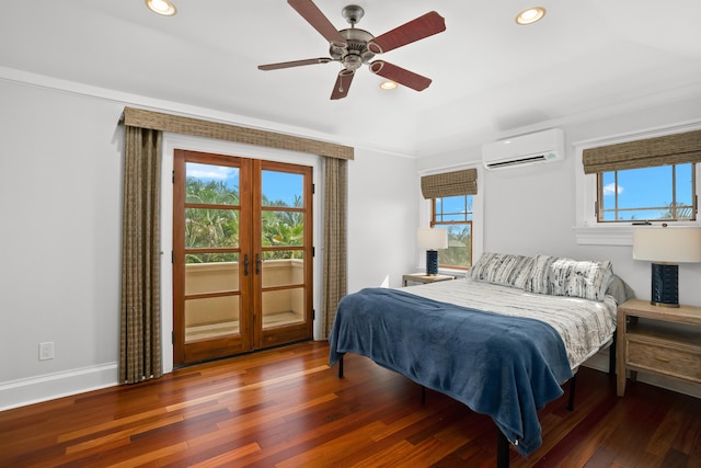 bedroom featuring a wall mounted AC, ceiling fan, dark hardwood / wood-style flooring, and french doors