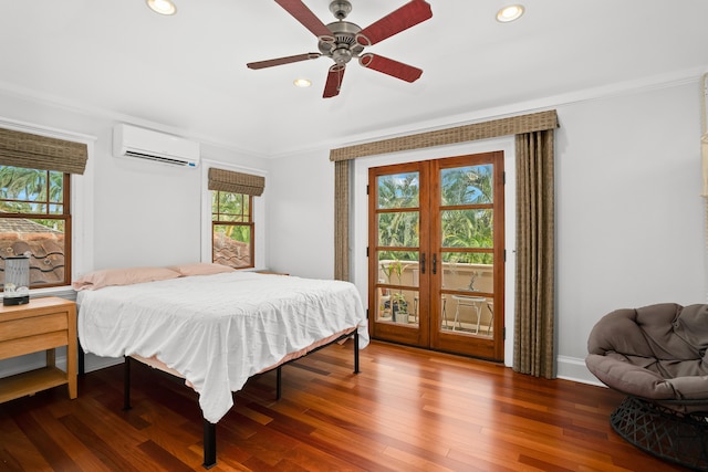 bedroom featuring ceiling fan, dark hardwood / wood-style flooring, ornamental molding, and a wall mounted AC