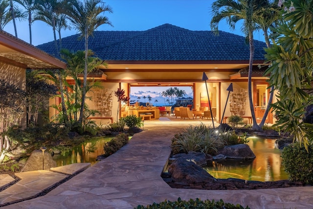 exterior space featuring an outdoor living space