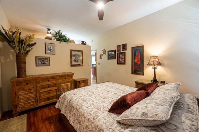 bedroom featuring ceiling fan and dark wood-type flooring