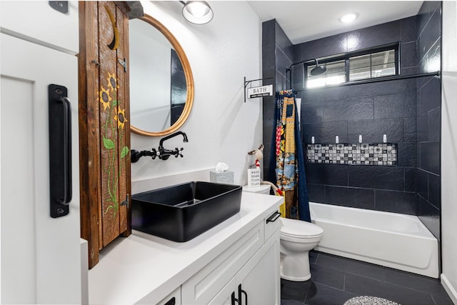 full bathroom featuring toilet, shower / tub combo, tile patterned floors, and vanity