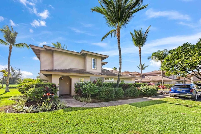 front of property featuring a front lawn