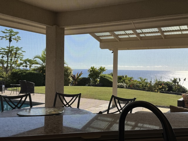 view of patio / terrace with a water view