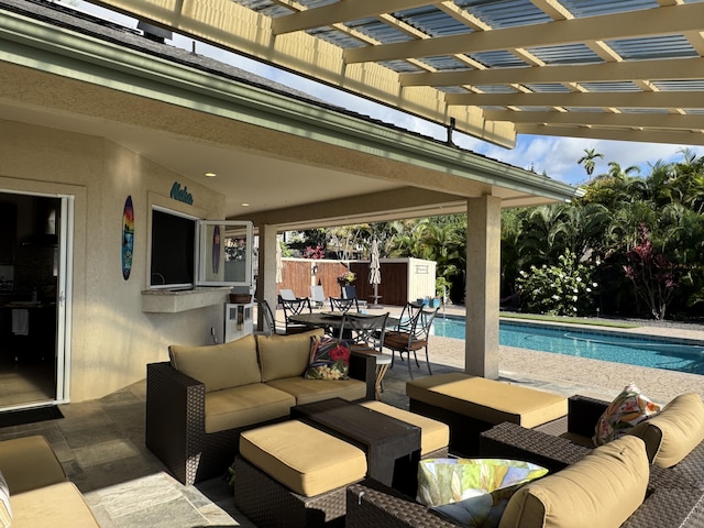 view of patio featuring a pergola, outdoor lounge area, and a fenced in pool