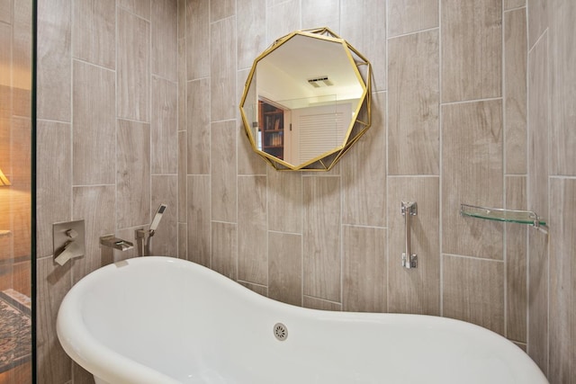 bathroom featuring a tub