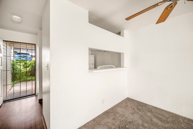 interior space with dark colored carpet