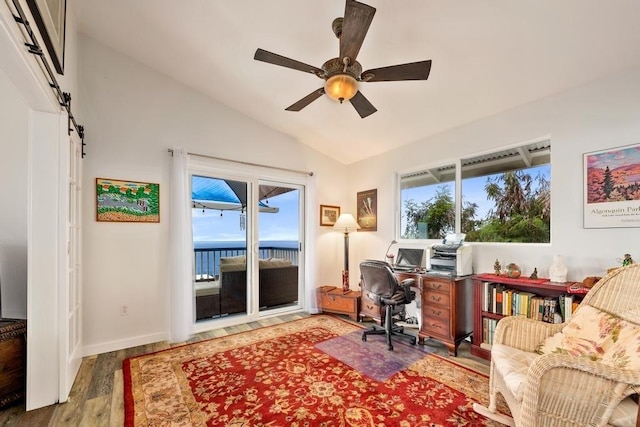 home office featuring a wealth of natural light, a water view, wood-type flooring, and ceiling fan