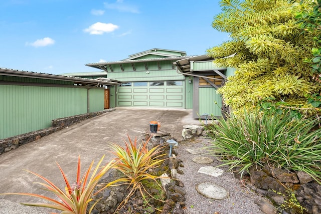 exterior space with a garage