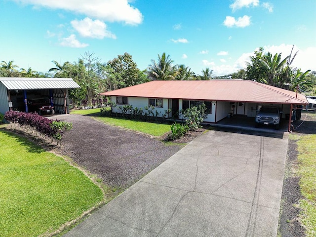 ranch-style home with a front lawn