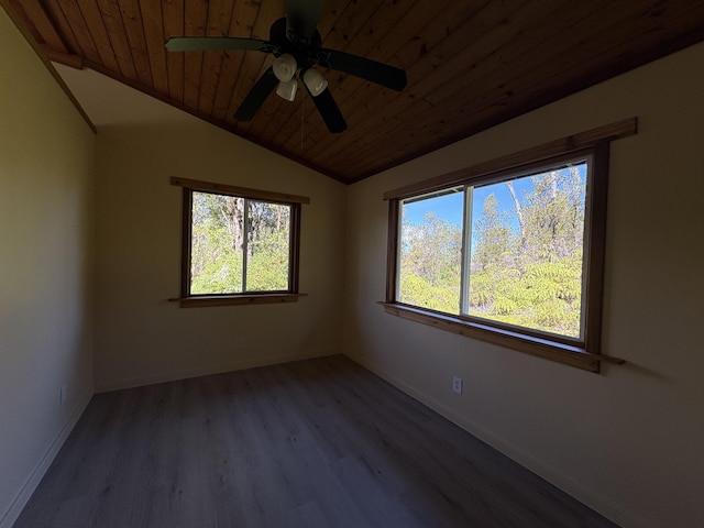 spare room with hardwood / wood-style flooring, vaulted ceiling, ceiling fan, and wood ceiling