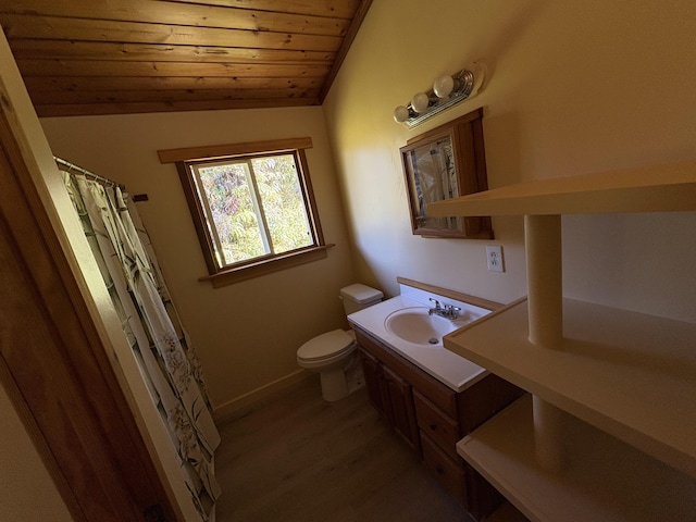 bathroom featuring lofted ceiling, wood ceiling, vanity, wood-type flooring, and toilet