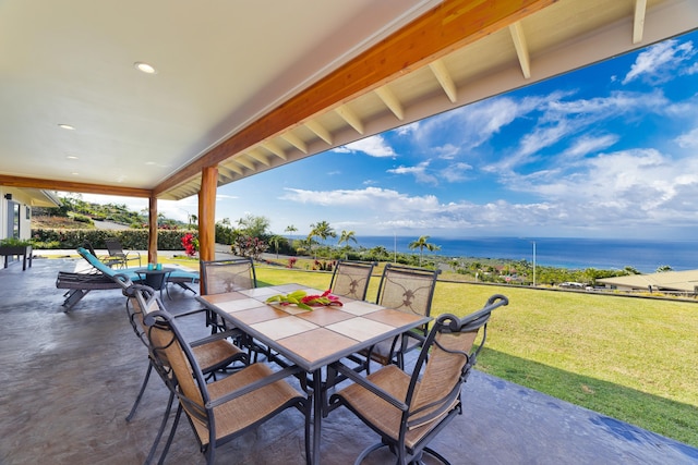 view of patio / terrace with a water view