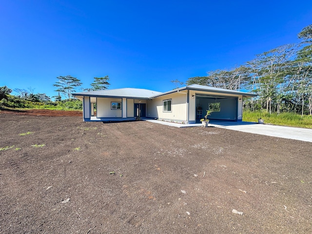 ranch-style house featuring a garage