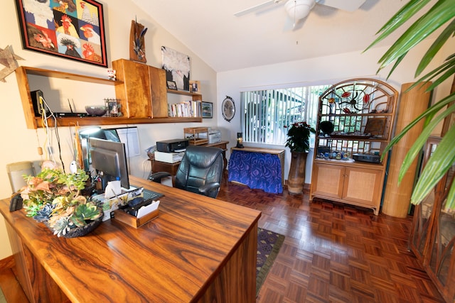 office area featuring dark parquet floors, ceiling fan, and vaulted ceiling