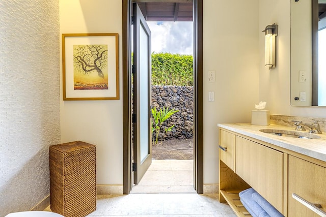 doorway to outside featuring sink