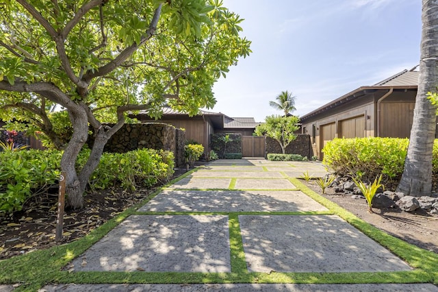 view of yard with a garage