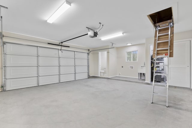 garage featuring a garage door opener