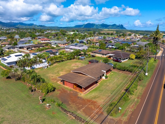 drone / aerial view featuring a mountain view