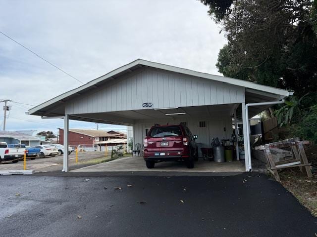 view of parking featuring a carport