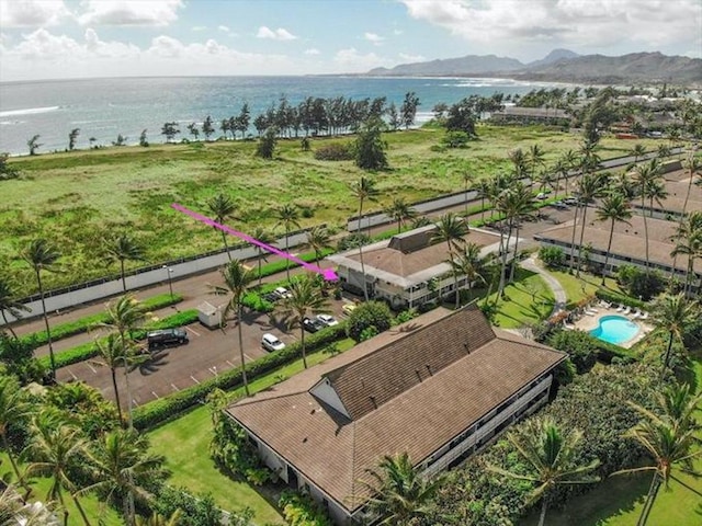 birds eye view of property featuring a water and mountain view