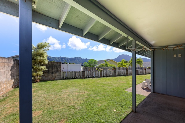 view of yard with a mountain view