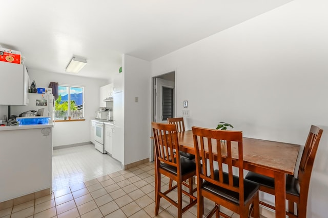 view of tiled dining space