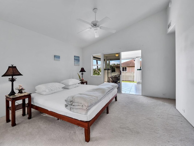 bedroom featuring ceiling fan, access to exterior, light carpet, and high vaulted ceiling