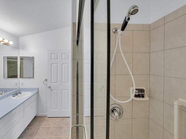 bathroom featuring vanity and walk in shower