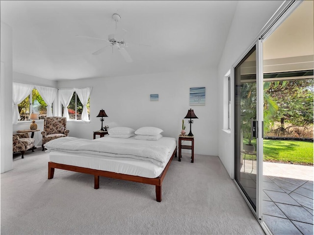 bedroom with ceiling fan, light colored carpet, and access to outside