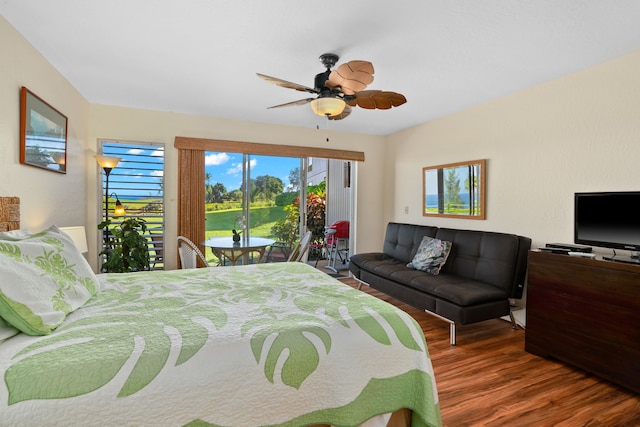 bedroom featuring hardwood / wood-style flooring, ceiling fan, and access to exterior