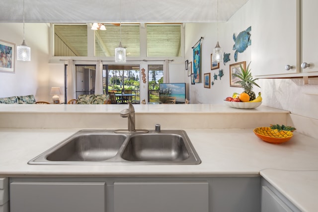 kitchen featuring sink and decorative light fixtures