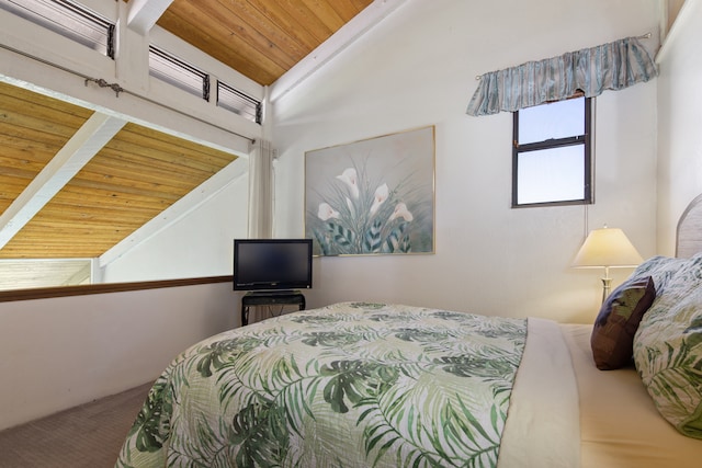 bedroom with lofted ceiling and wooden ceiling