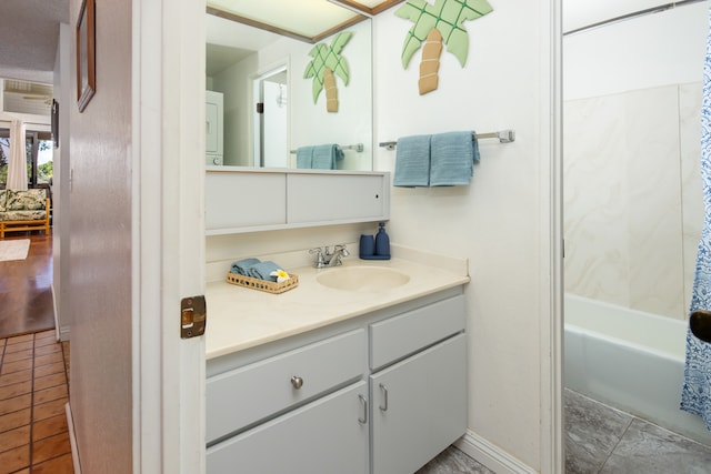 bathroom featuring vanity and shower / bath combo with shower curtain