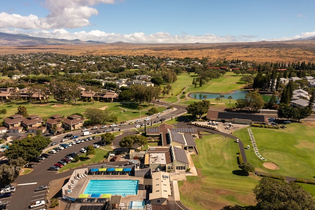 bird's eye view with a water and mountain view