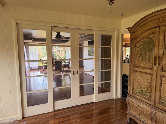 doorway featuring dark hardwood / wood-style floors and french doors