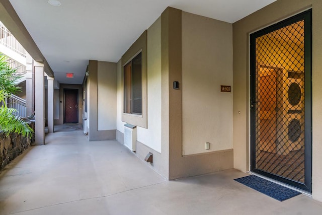 entrance to property featuring radiator