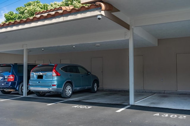 view of parking featuring a carport