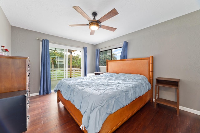 bedroom with ceiling fan and dark hardwood / wood-style floors