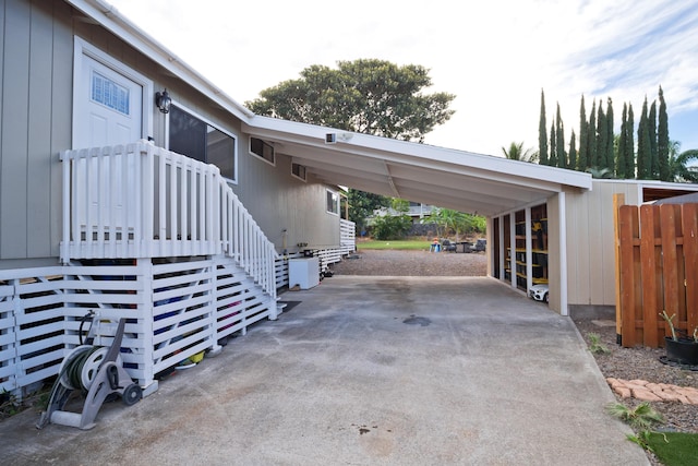 view of property exterior featuring a carport