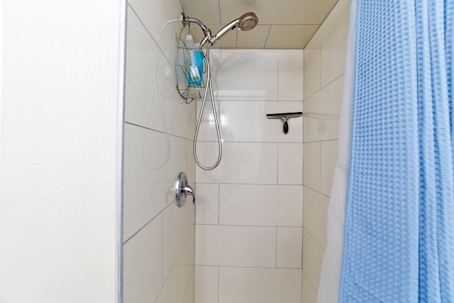 bathroom with curtained shower