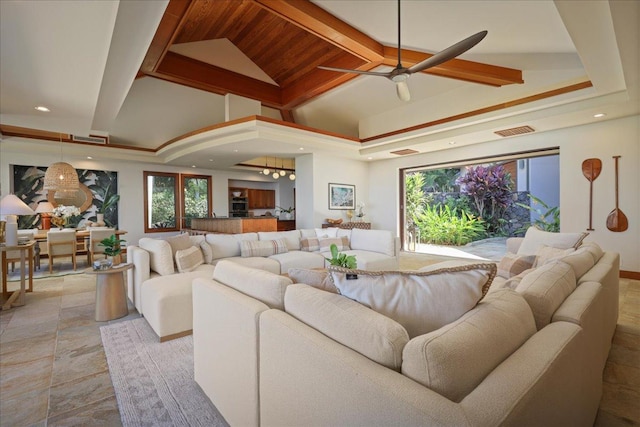 living room with ceiling fan and wooden ceiling