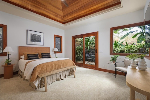 carpeted bedroom featuring access to exterior and ceiling fan