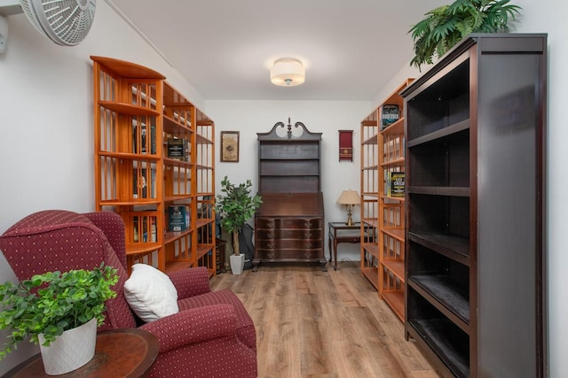 sitting room with hardwood / wood-style floors