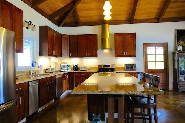 kitchen featuring a center island, a breakfast bar, wood ceiling, stainless steel appliances, and wall chimney exhaust hood