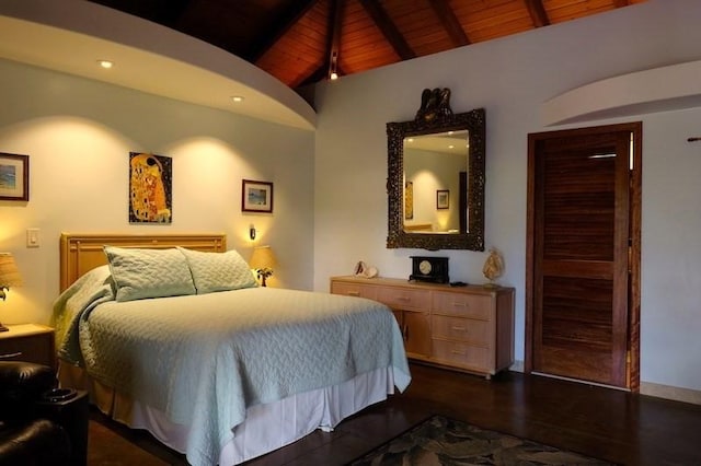 bedroom with dark hardwood / wood-style flooring, wood ceiling, and lofted ceiling with beams