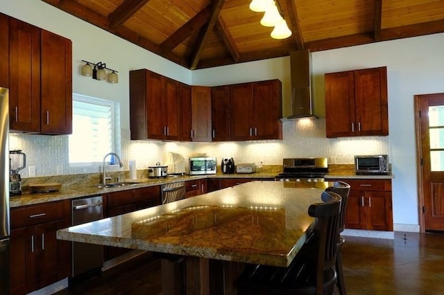 kitchen featuring appliances with stainless steel finishes, a center island, wall chimney exhaust hood, vaulted ceiling with beams, and wooden ceiling