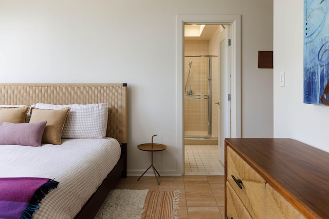 tiled bedroom featuring connected bathroom