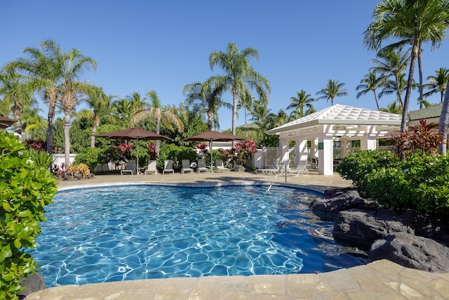 view of swimming pool featuring a gazebo