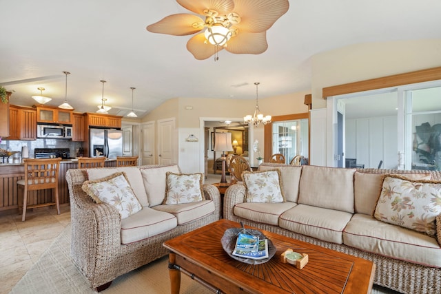 living room with vaulted ceiling and ceiling fan with notable chandelier